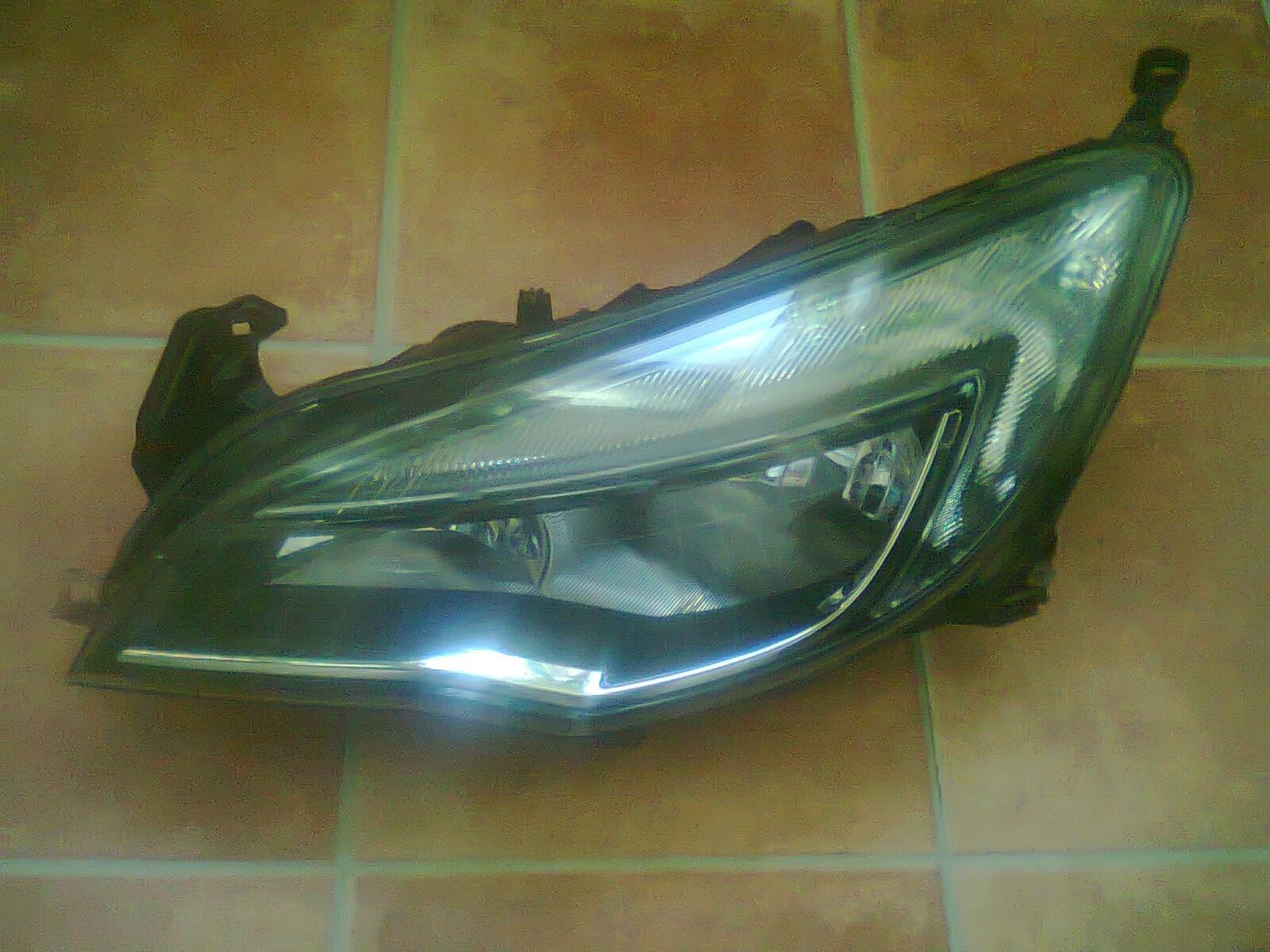 Faruri originale SH Opel Astra J(2009-2015)1LG010011-69HELLA