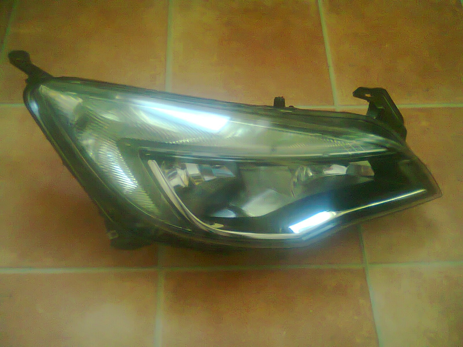 Faruri originale SH Opel Astra J(2009-2015)1LG010011-69HELLA