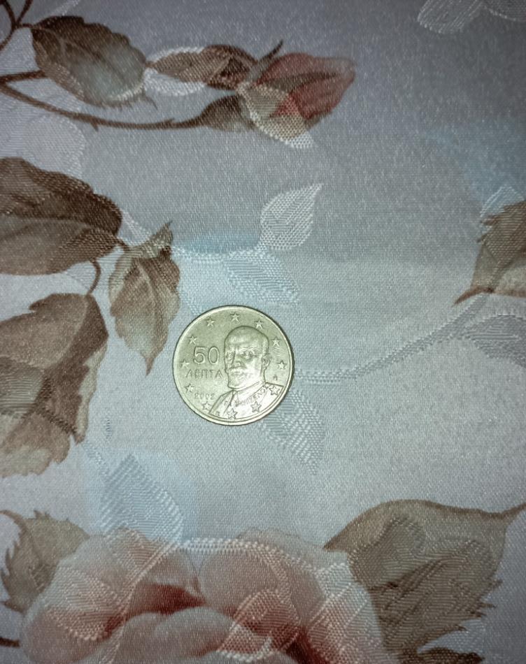 această monedă (cu AENTA) 50 de euro din ANUL 2002 CENT