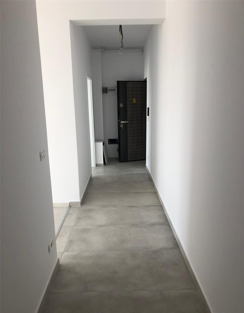 Apartament 2 camere, decomandat, doua balcoane, 55 mp,  loc de parcare acoperit