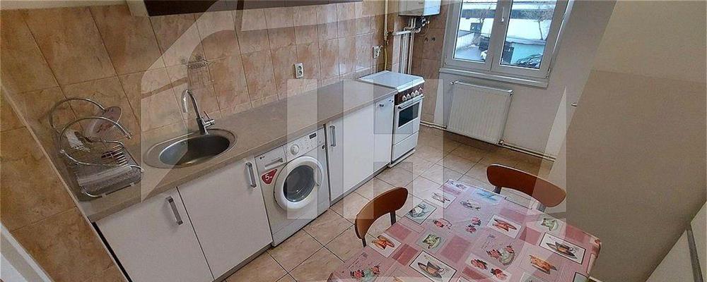 Apartament 2 camere, etaj 2, decomandat, parcare, zona Piata Marasti