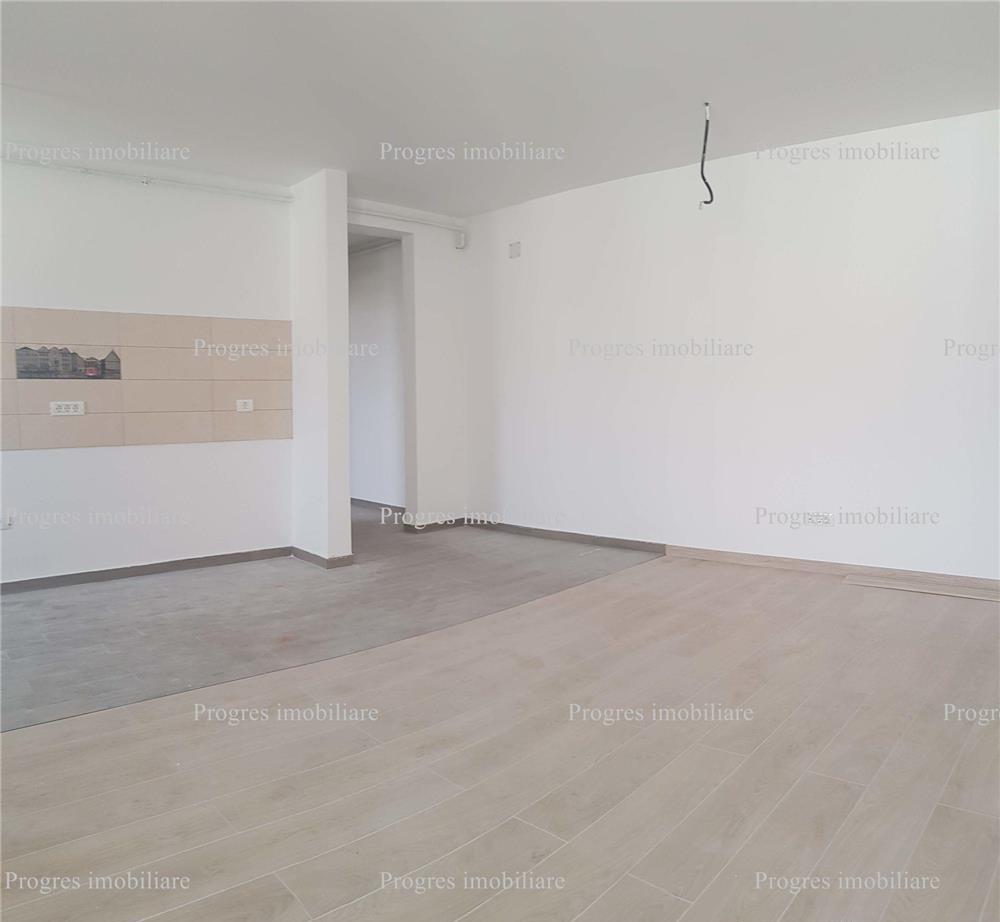 Apartament 2 camere , loc de parcare , bloc nou , 30 mp curte , 70.000 euro