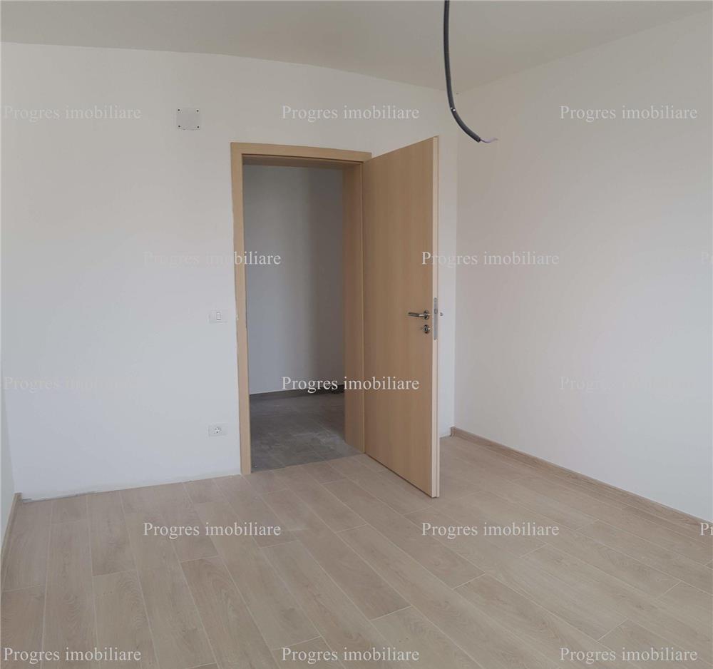 Apartament 2 camere , loc de parcare , bloc nou , 30 mp curte , 70.000 euro