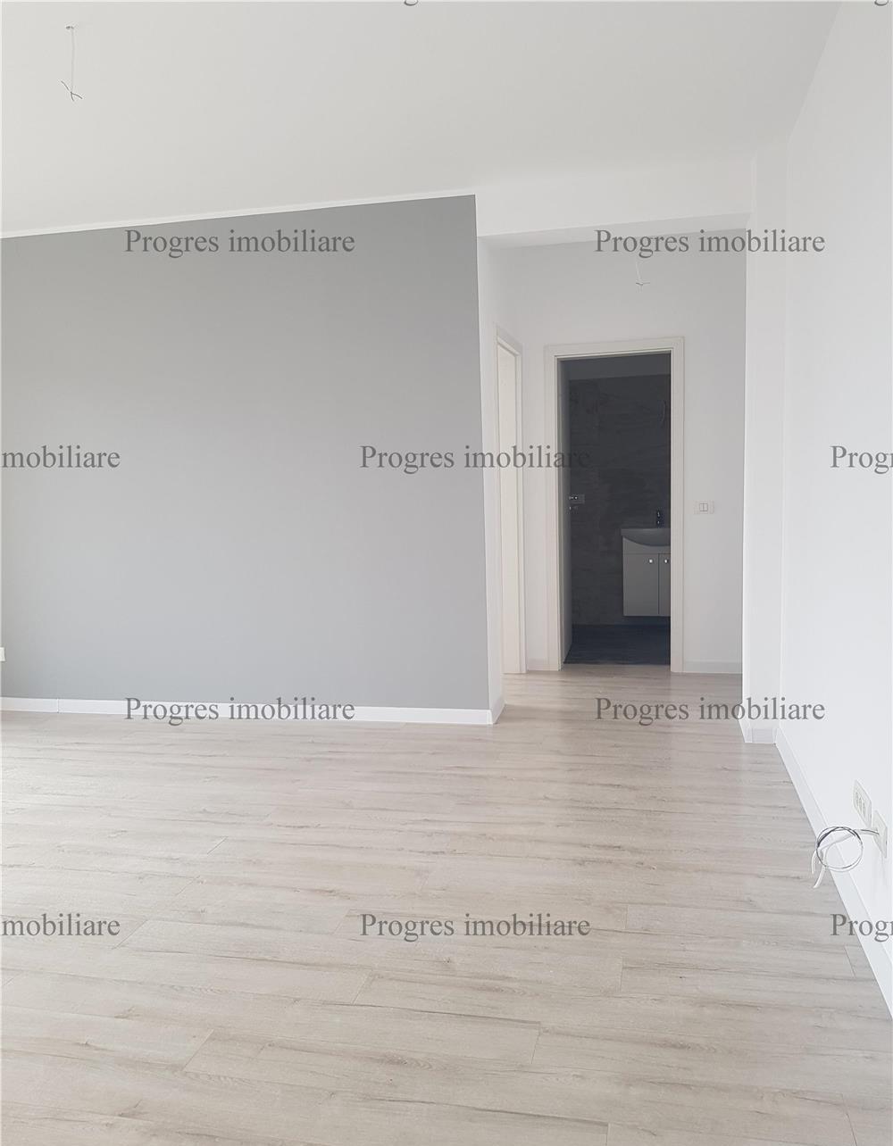 Apartament cu 2 camere+terasa+loc de parcare