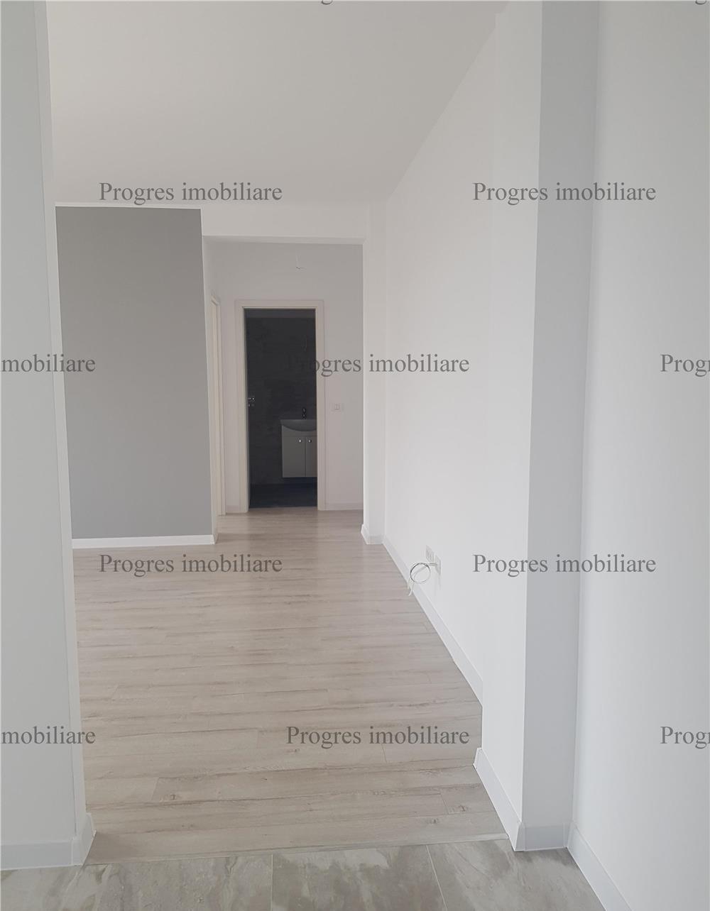 Apartament cu 2 camere+terasa+loc de parcare