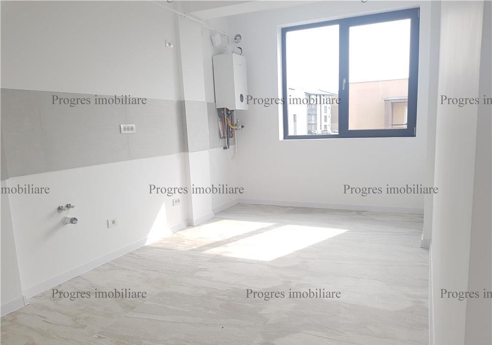 Apartament cu 2 camere+terasa+loc de parcare