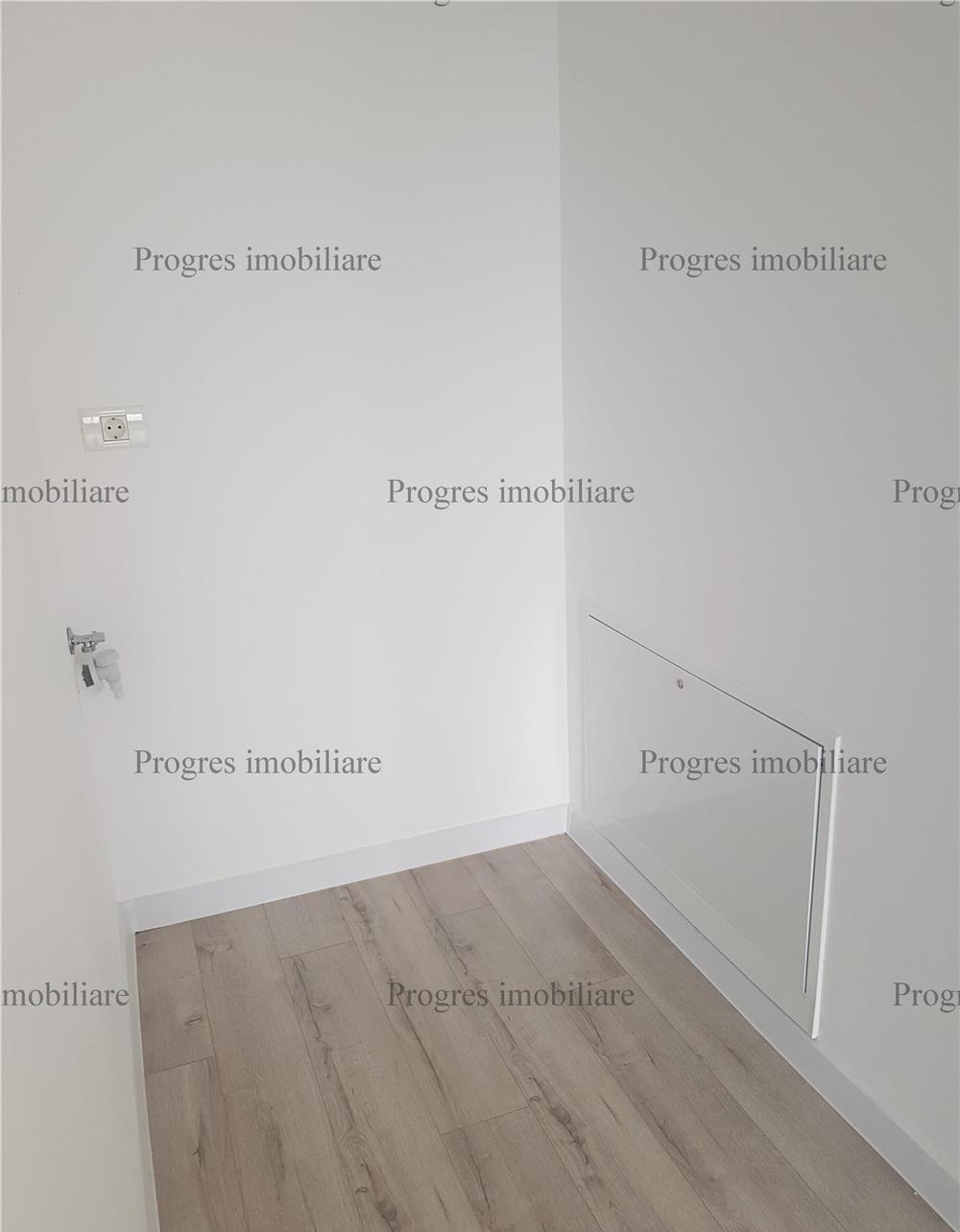 Apartament cu 2 camere+terasa+loc de parcare