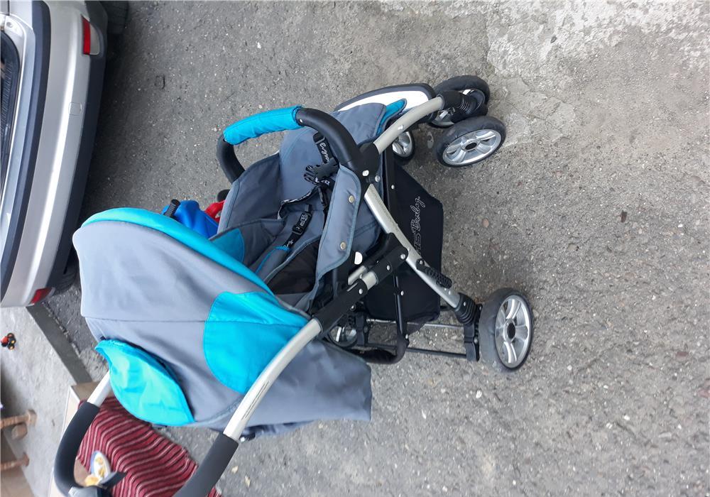 Carucior cu maner reversibil