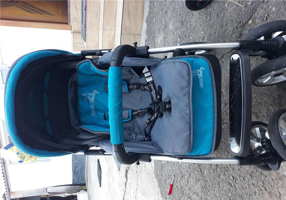 Carucior cu maner reversibil