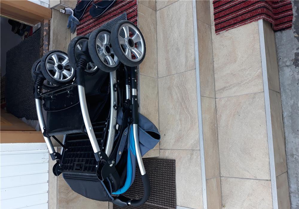 Carucior cu maner reversibil