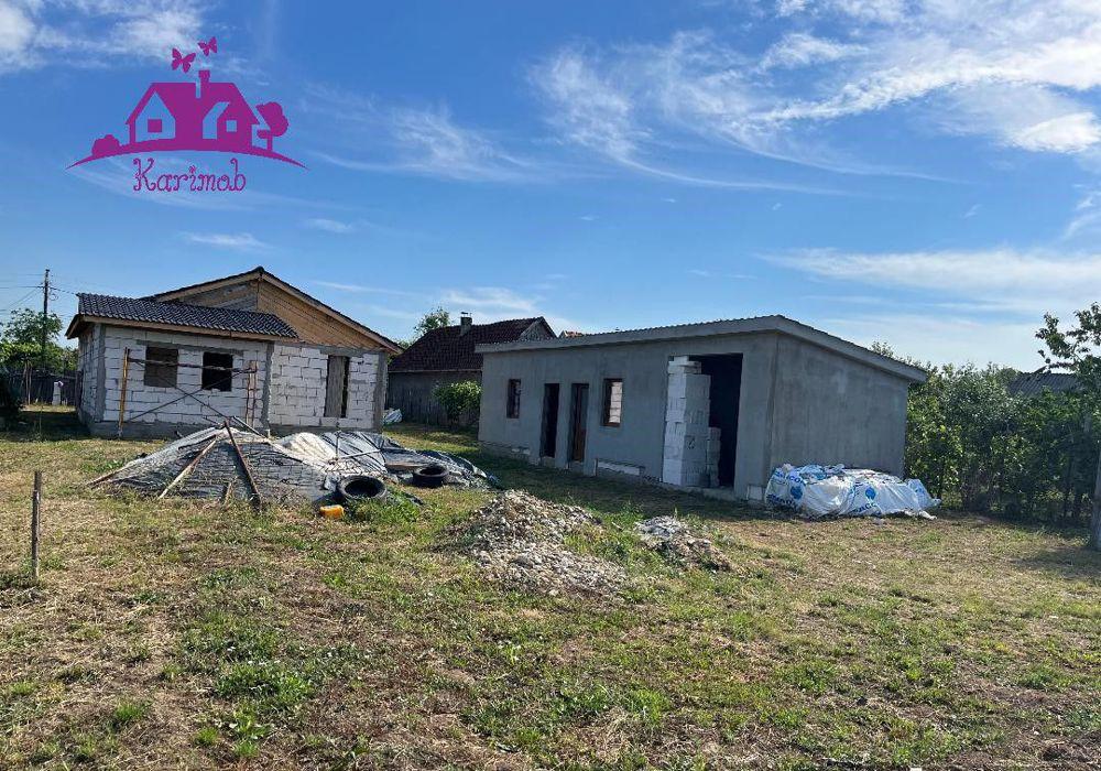 Casa la rosu  in localitatea Gepiu