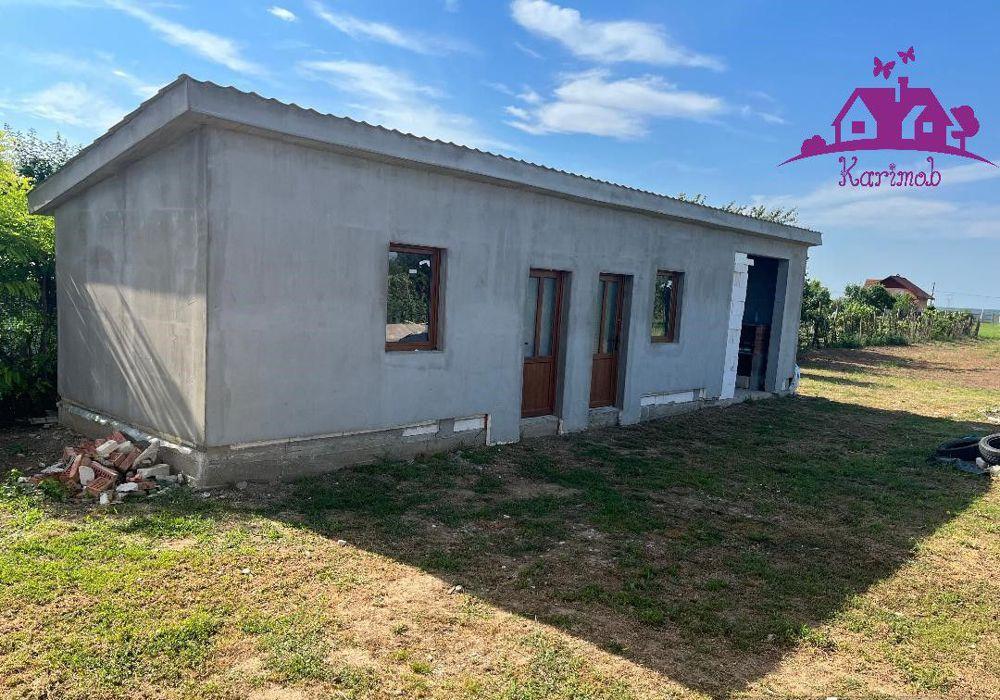 Casa la rosu  in localitatea Gepiu