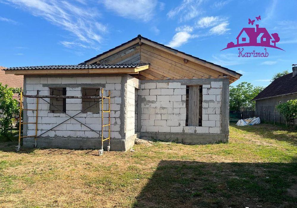 Casa la rosu  in localitatea Gepiu