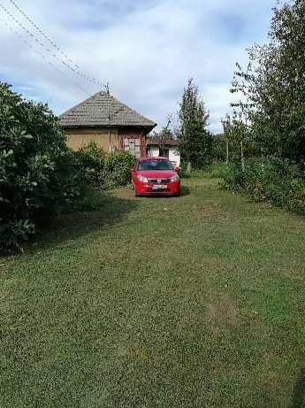 Casa si livada pomi