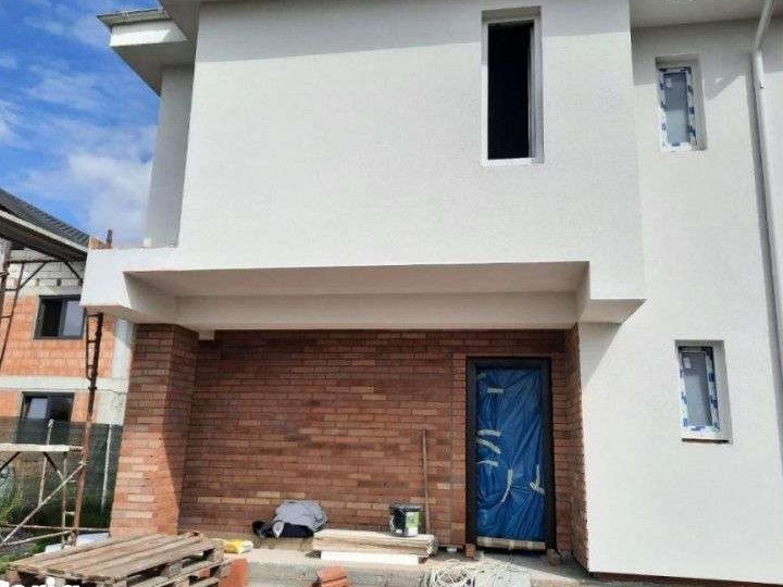 Casa superba cu dormitor la parter/3 bai/teren 450 mp Magurele
