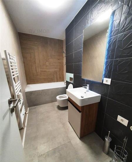 Coresi Apartament nou 2 camere + 1 logie si loc parcare