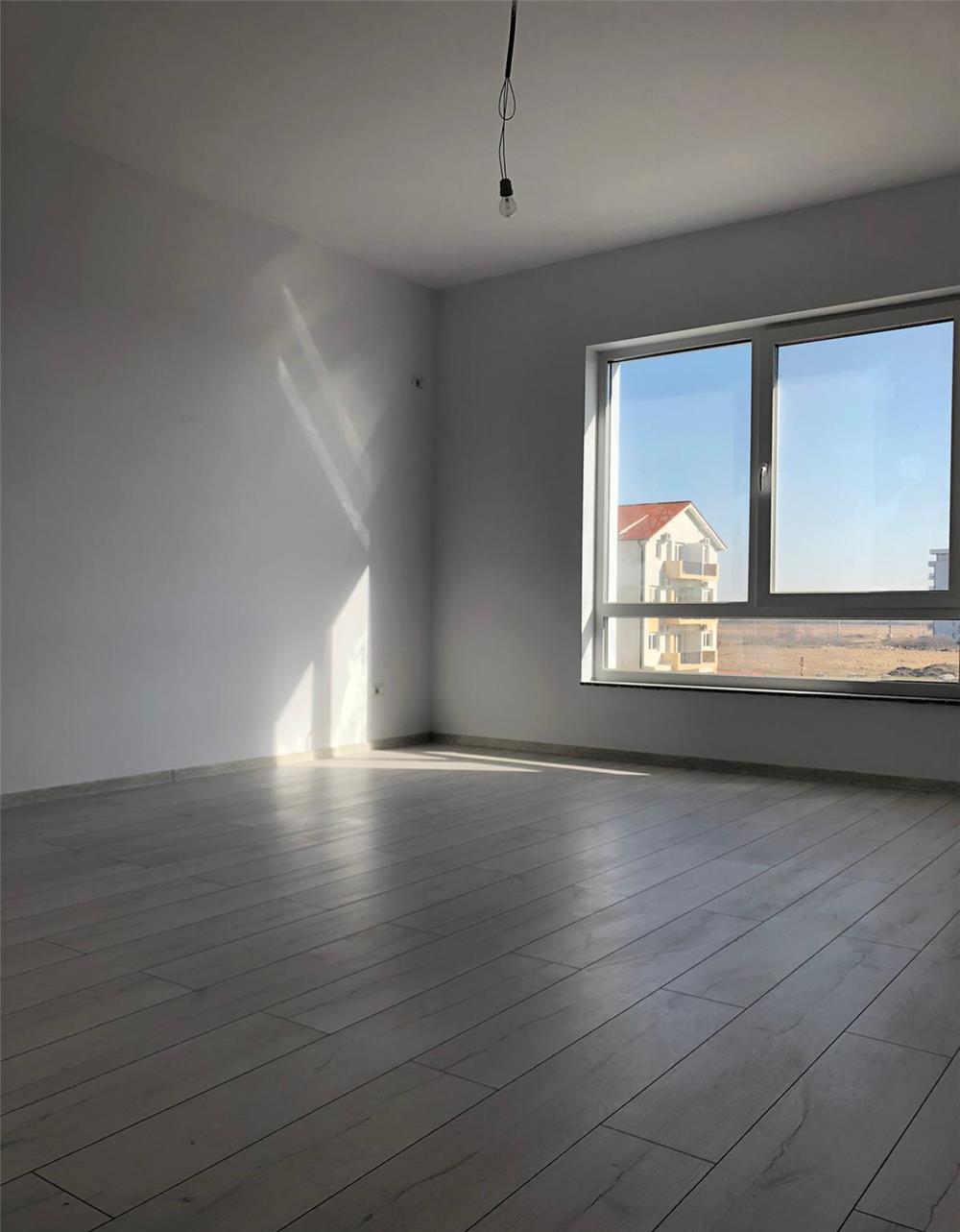 DEOSEBIT 2 cam decomandat 2 balcoane LOC PARCARE ACOPERIT 54 mp Braytim 71000 euro