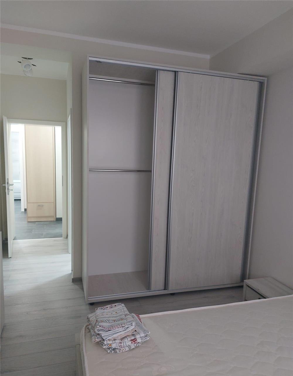Doua bai 67 mp utili balcon loc parcare amenajat Braytim