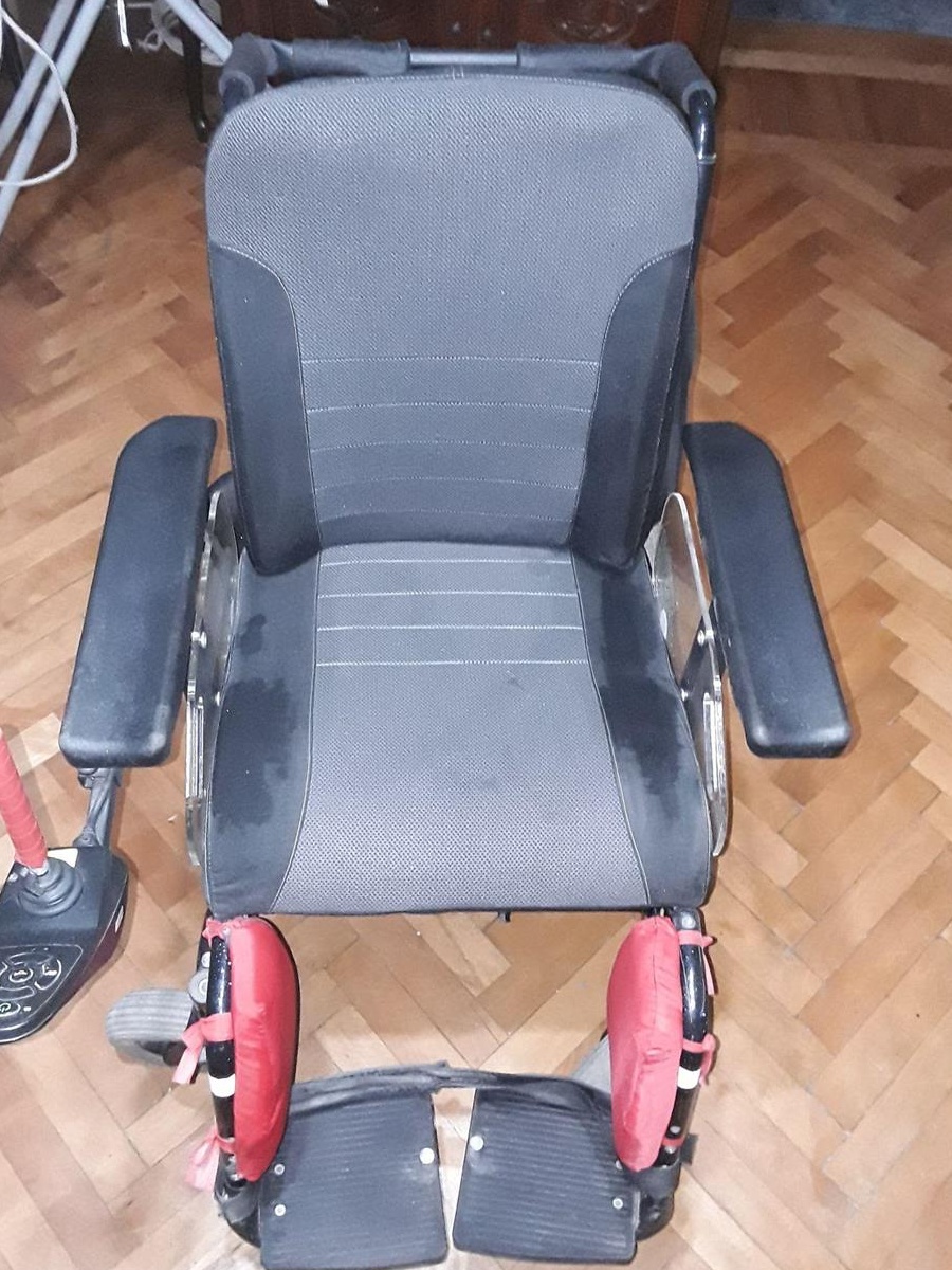 Fotoliu electric persoane cu dizabilitati