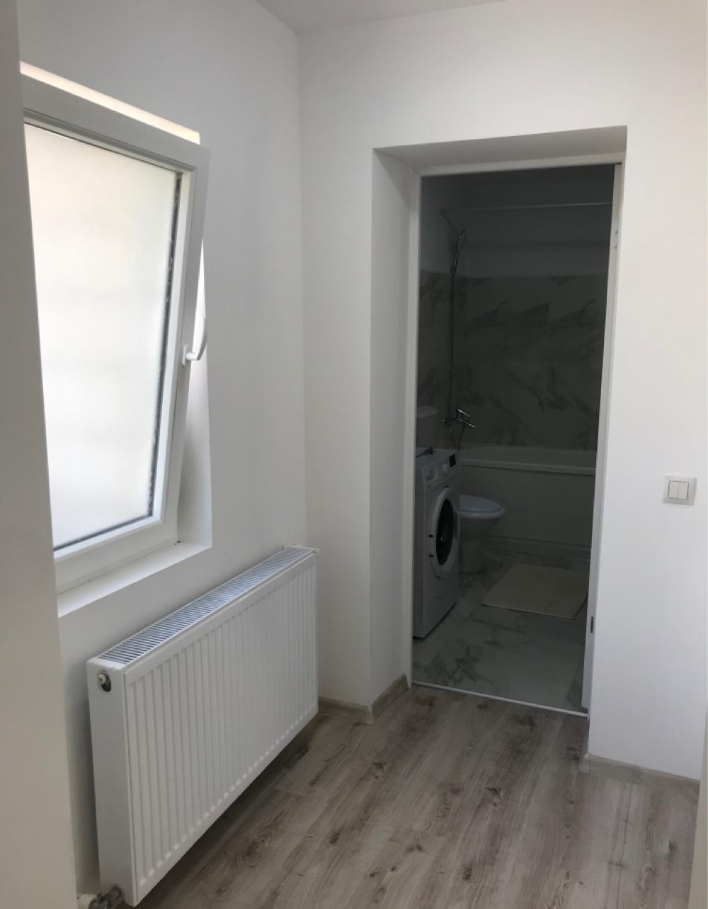 inchiriez apartament la casa aproape de colina