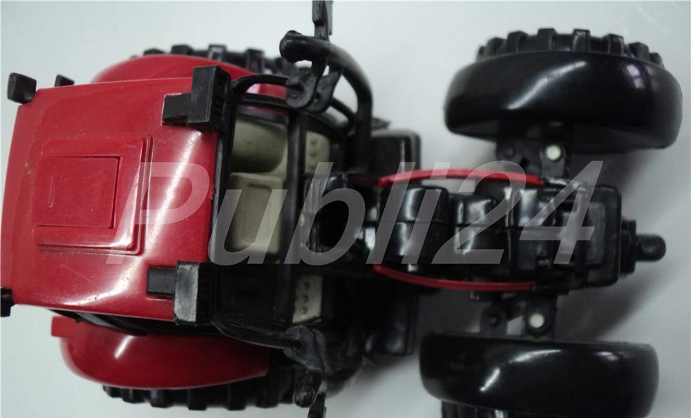 Jucarie Tractor Rosu cu suspensii articulate