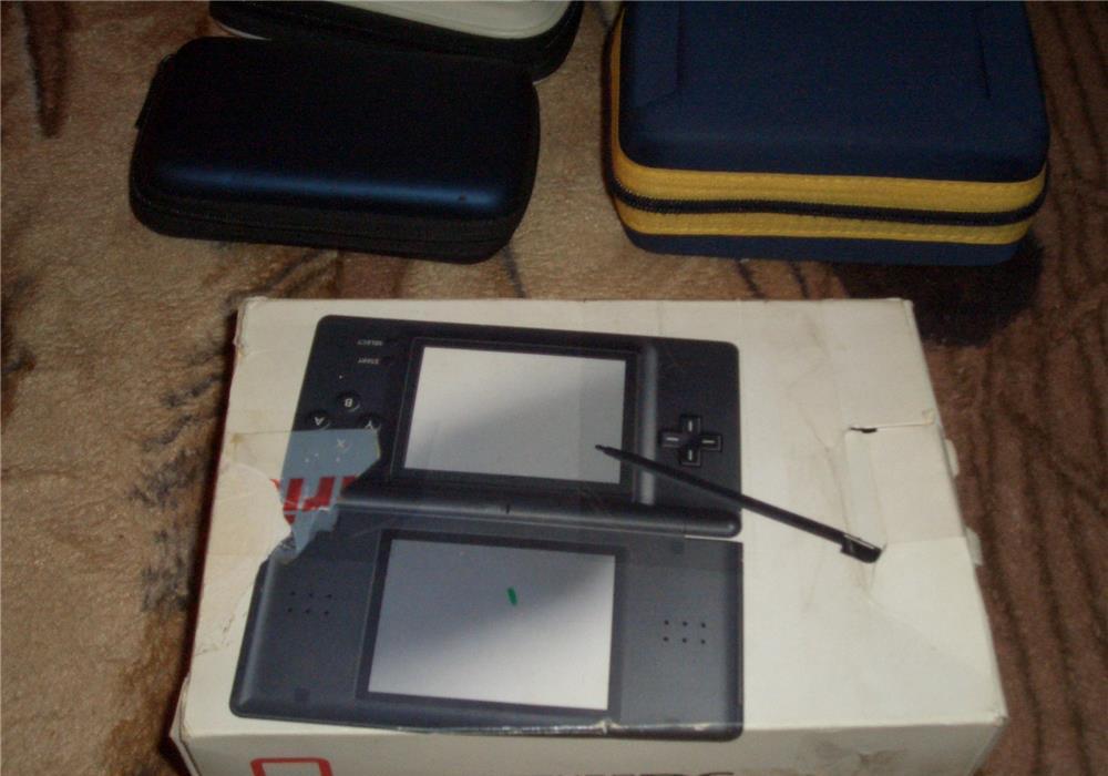 Nintendo Ds Lite nou la cutie nefolosit +42 jocurii originale (schimb)