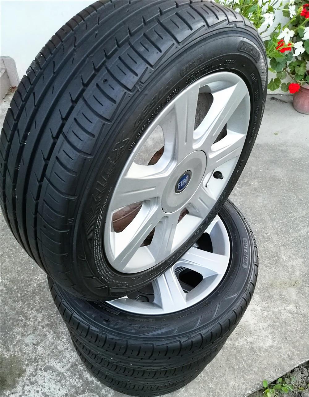 Piesa Originala FIAT - Jante cu anvelope R15 de vara 4x98 Bravo Punto Roti
