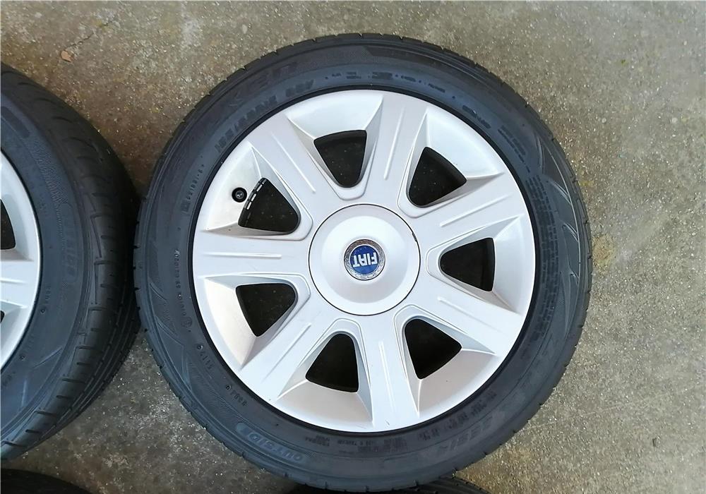 Piesa Originala FIAT - Jante cu anvelope R15 de vara 4x98 Bravo Punto Roti