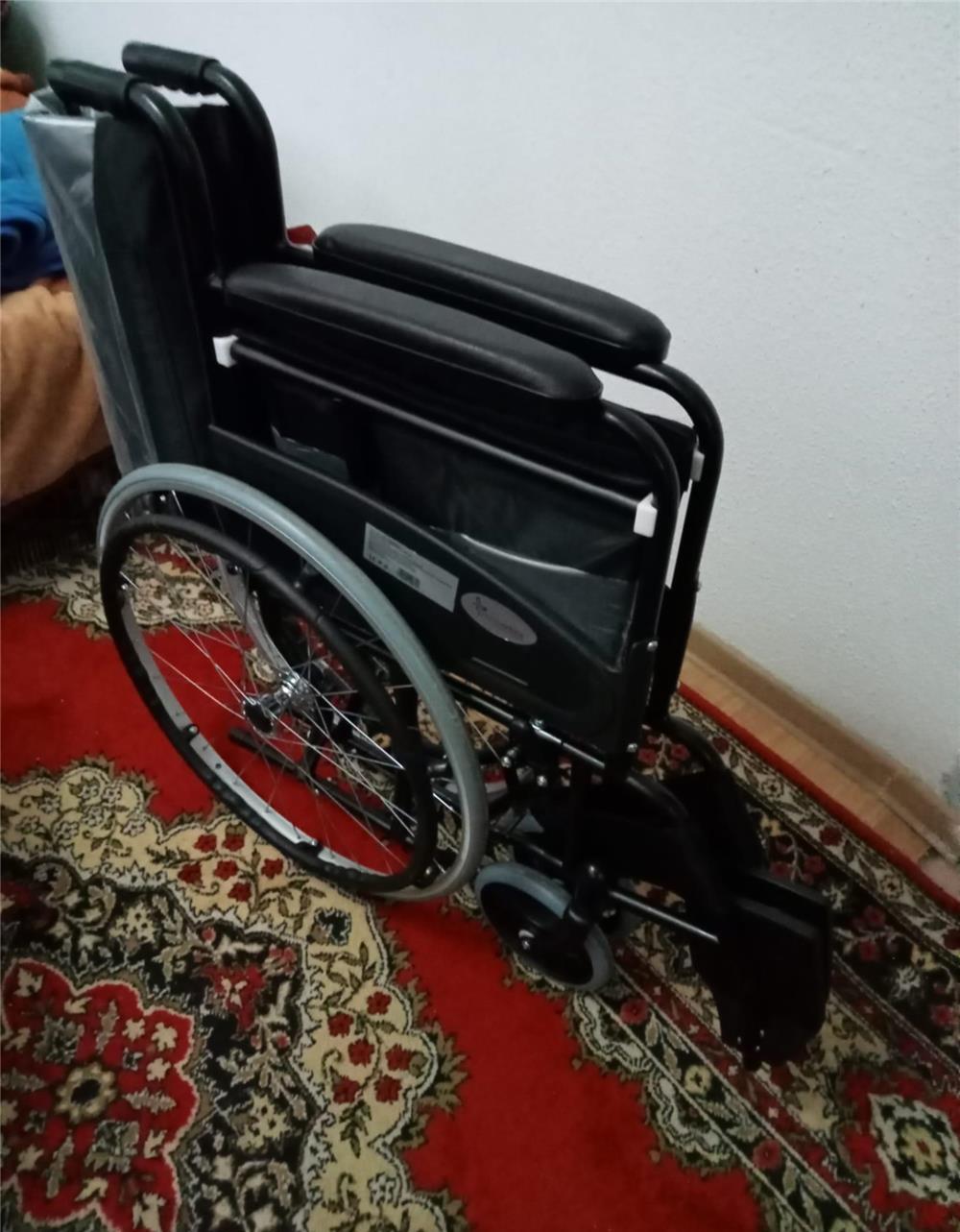 Scaun cu Rotile din otel