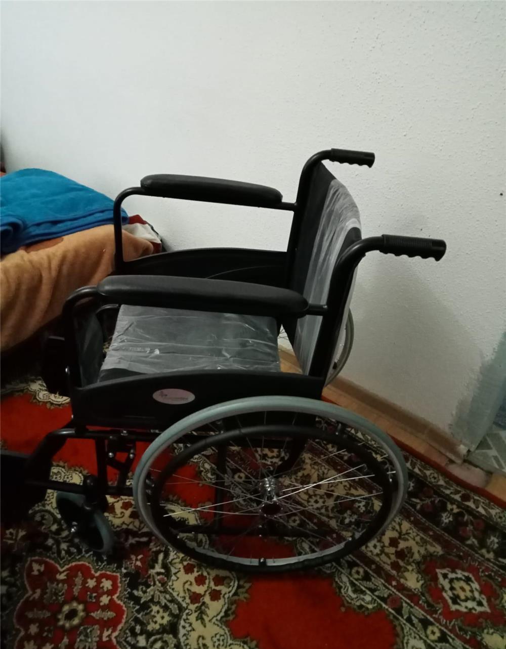 Scaun cu Rotile din otel