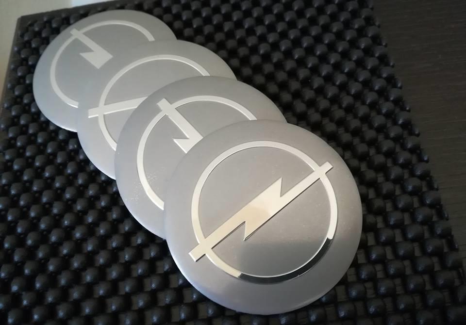 Set embleme roți Opel diametrul 56 mm