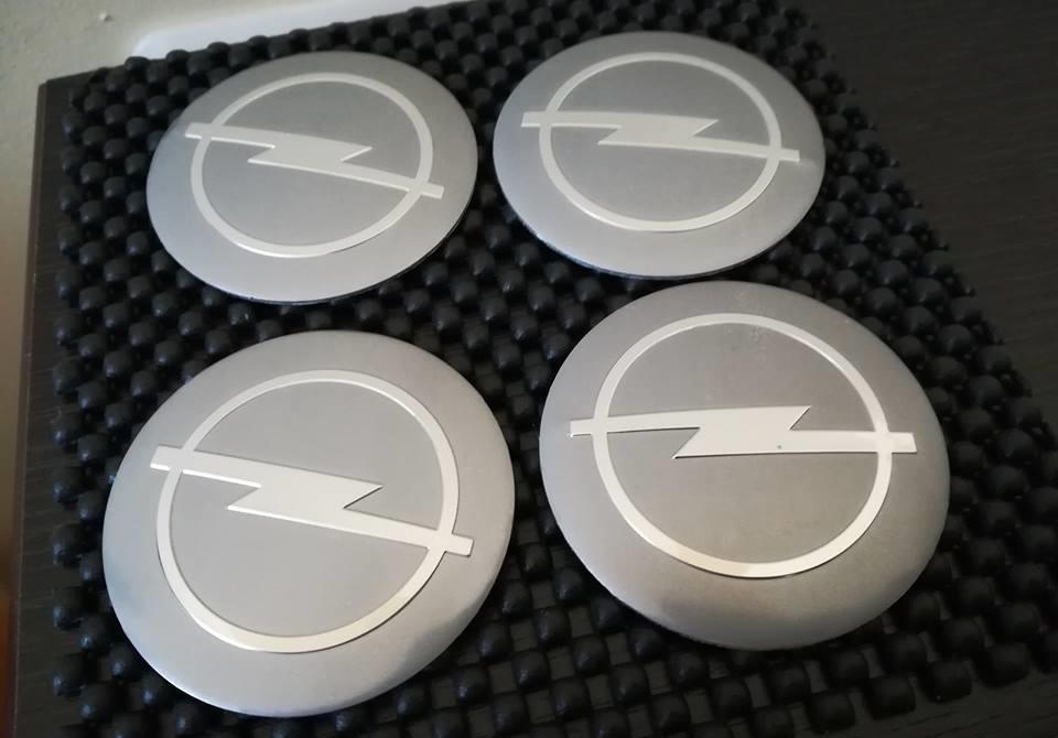 Set embleme roți Opel diametrul 56 mm