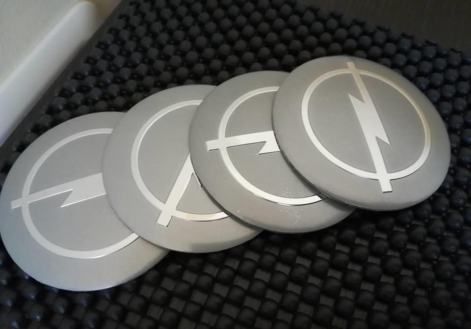 Set embleme roți Opel diametrul 56 mm