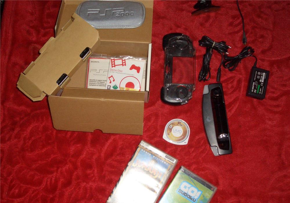 Sony PSP La Cutie cu 12 jocurii Originale +Filme Accesori Diverse Conexiune Internet jocuri multi