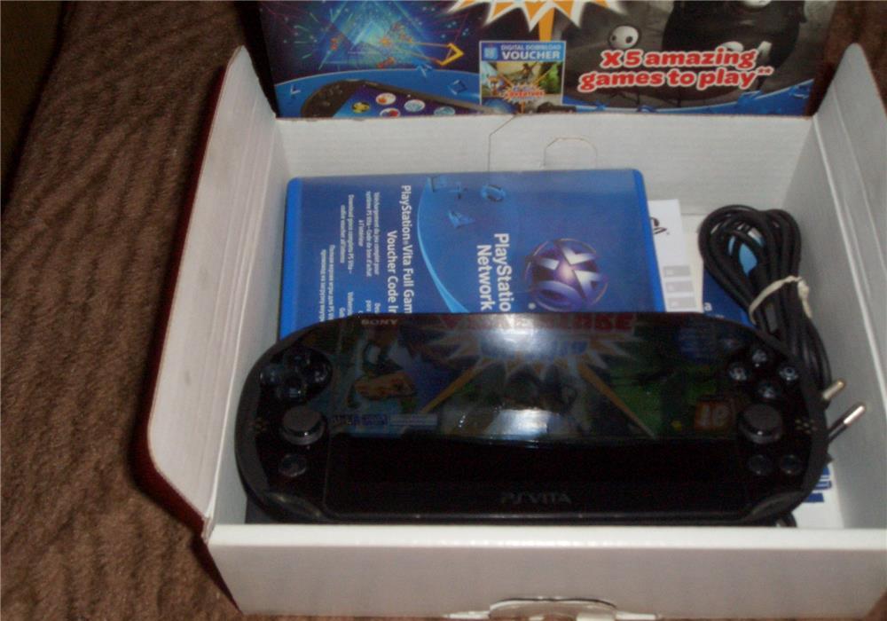 SONY PSP VITA MODAT NOU NOUT ULTIMUL MODEL COMPLET LA CUTIE 4 JOCURII (schimb)