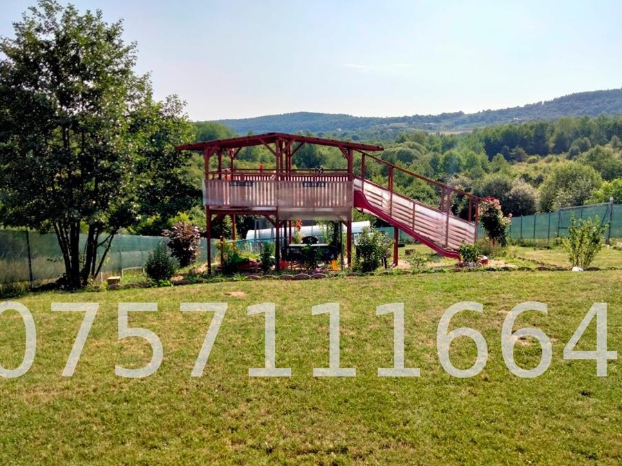 Teren 1000mp Sălicea, front 50m, garaj, foișor, loc de joacă, grădină și solar
