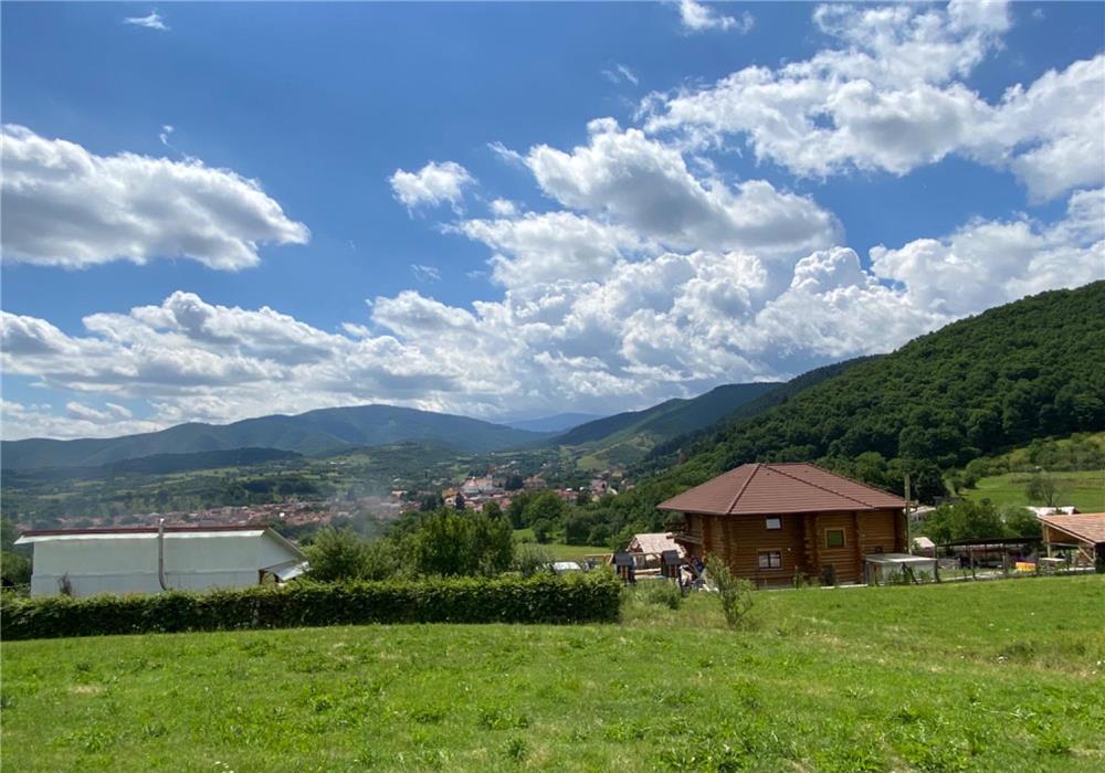 Teren Extravilan Rasinari,  la asfalt, vecin cu case de vacanta locuite
