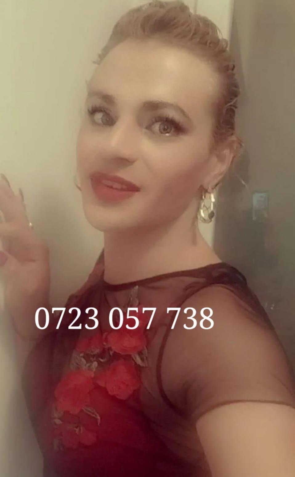 TRANSEXUALA  blonda , ochii albastrii fund bombat FULL SERVICE !! GATANTEZ REVENIREA