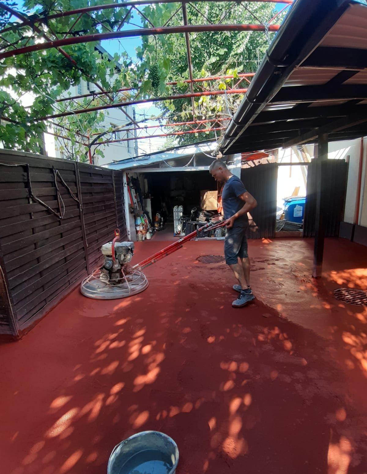 Turnare beton finisat mecanic cu elicopter și cuart