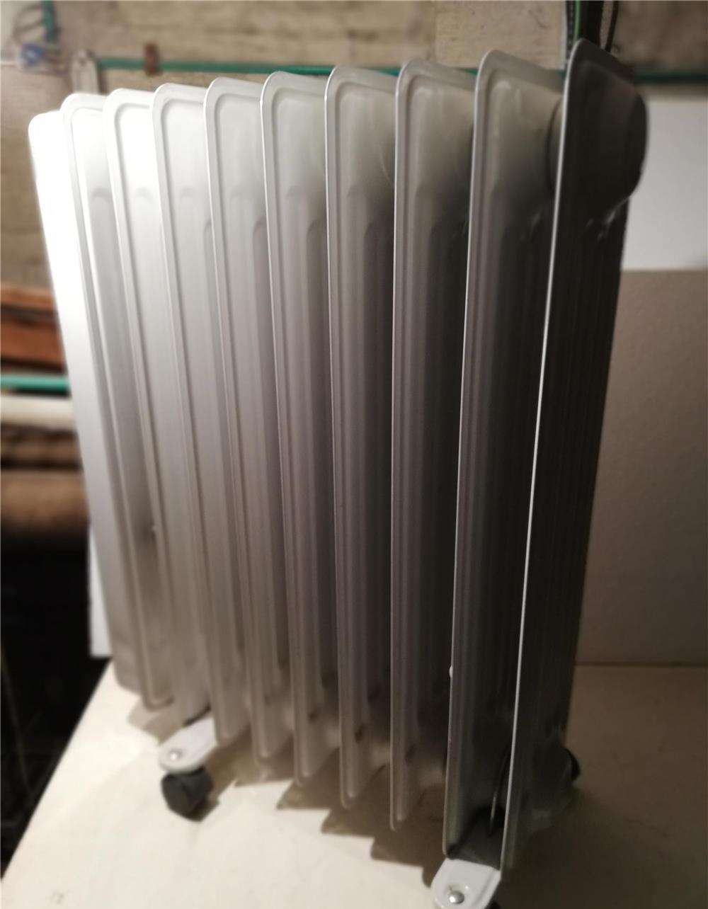 Vând calorifer electric cu ulei, marca Heller