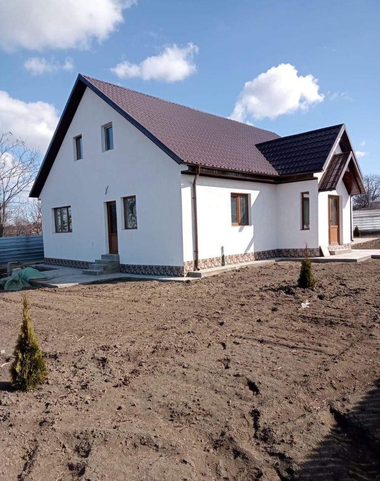 Vand casa cu masarda