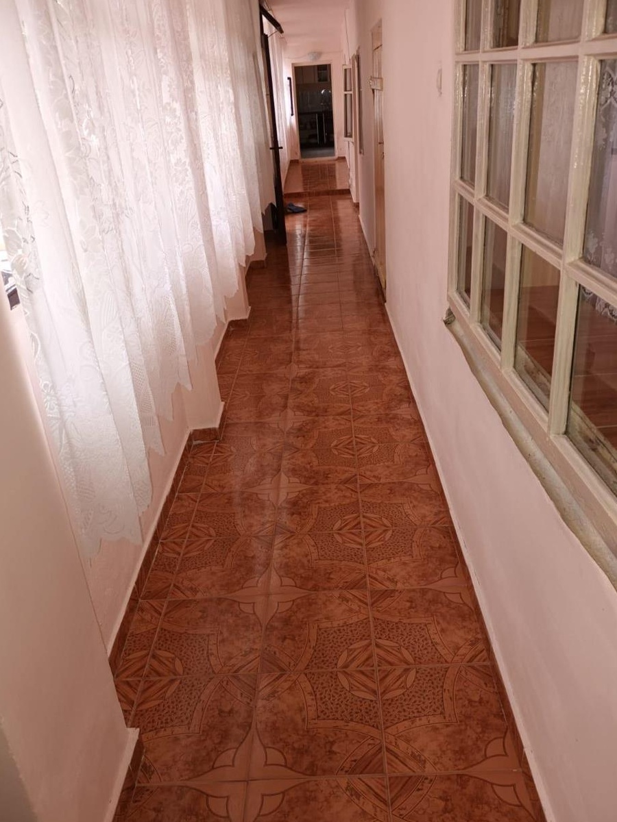 Vand casa de caramida cu teren 1100mp mobilata si utilata ,pret 39.700euro negociabil