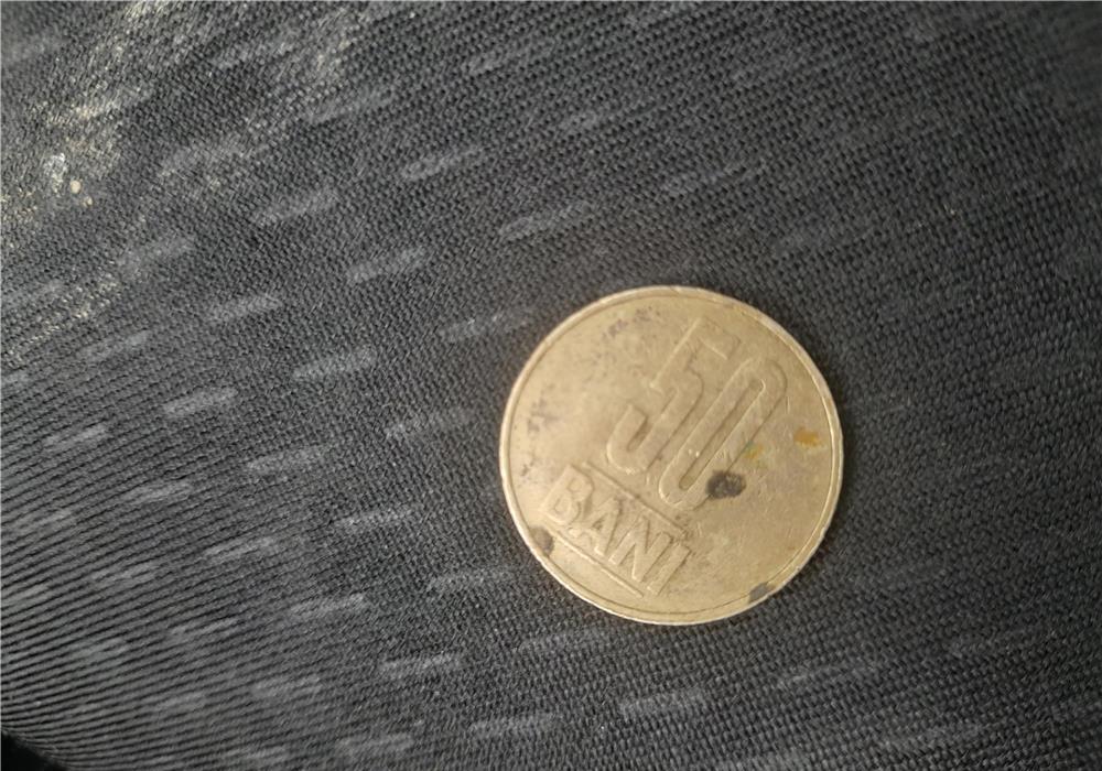 Vand moneda 50 de bani din  2006
