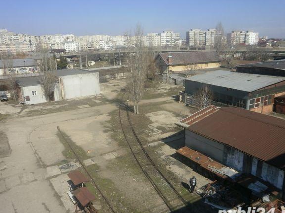 VAND PROPRIETATE INDUSTRIALA CU CALE FERAT