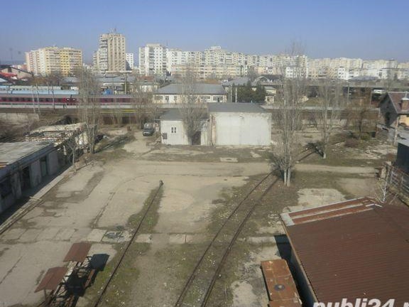 VAND PROPRIETATE INDUSTRIALA CU CALE FERAT