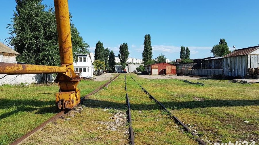 VAND PROPRIETATE INDUSTRIALA CU CALE FERAT